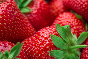 Fresh strawberry background. Ripe  in close-up.