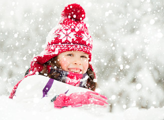 Active child playing outdoors in winter