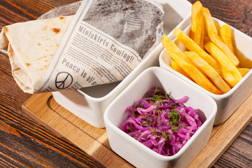shawarma with salad and French fries