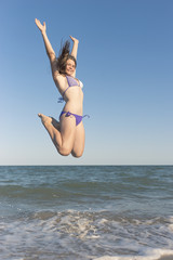 Happy children in the summer on the beach.