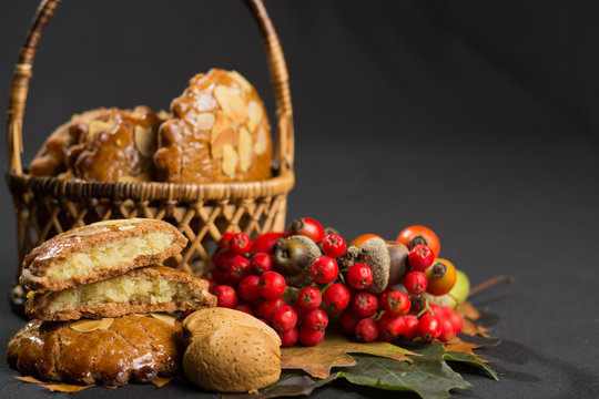 Typical Dutch filled spicy  cookies with almonds in autumn colors copy space