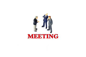 Miniature businessman with meeting concept