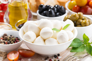 ingredients for salad with mozzarella, closeup, selective focus