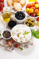 ingredients for salad with mozzarella, vertical, top view
