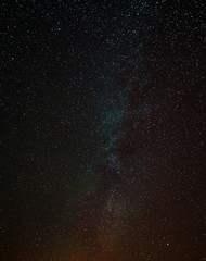 The real photo of the Milky Way. Stars, constellations and galaxies in the black sky