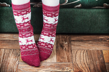 Christmas female legs in socks  