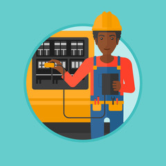 Electrician with electrical equipment.