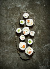 Japanese rolls with fish and vegetables.