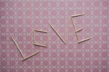 the word love is laid out from the sticks, I love you