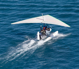 plane takes off from the surface of the water