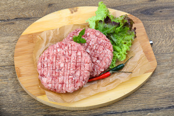 Raw burger cutlet