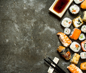 Sushi rolls with seafood and soy sauce. © Artem Shadrin