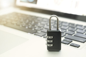 Closeup padlock on computer keyboard for concept data lock security