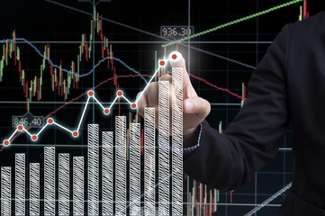 businessman hand with drawing a graph chart and business strategy for business finance and banking concept.