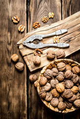 Walnuts with Nutcracker on the Board.