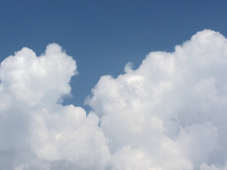 Fototapeta premium Sky with giants cumulonimbus clouds and sun rays through