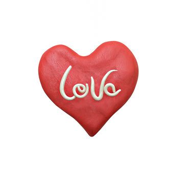 Red valentine heart and white lettering made with plasticine