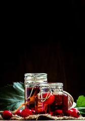 Alcohol tincture of hawthorn berries, vintage toned photo, selec