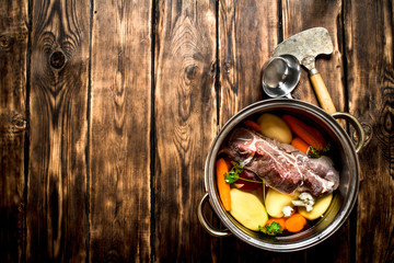 Beef soup with fresh vegetables.
