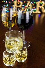 Glasses of red and white wine and whiskey