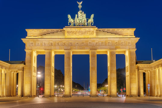 The famous Brandenburg Gate in Berlin illuminated at night