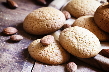 Homemade almond cookies, vintage wooden background, toned image,