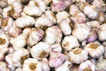 Fresh garlic bulbs for sale at a market