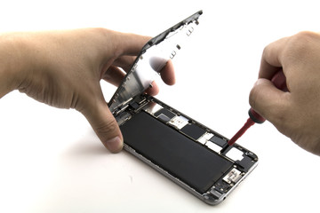 One man was replacing mobile phone batteries. Process change battery Smart Phone 5.5 inch