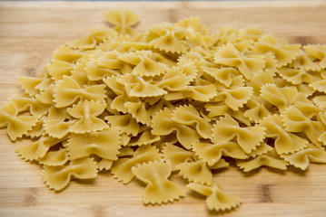 Closeup of uncooked italian pasta - farfalle