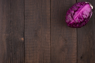 red cabbage on the old wooden table.