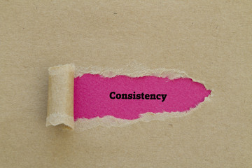 Consistency word written under torn paper.