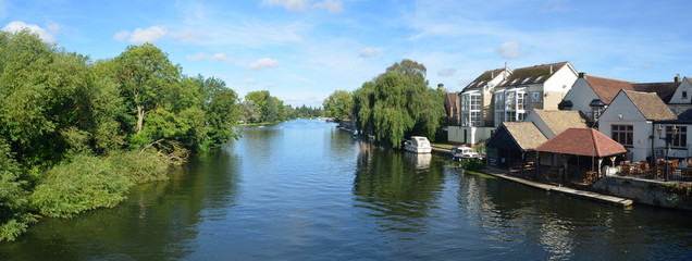  The river Ouse, Regatta meadows and riverside buildings at St Neots Cambridgeshire England.