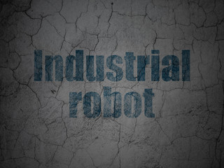 Manufacuring concept: Industrial Robot on grunge wall background
