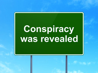 Politics concept: Conspiracy Was Revealed on road sign background