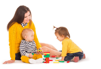 Mom and two kids playing