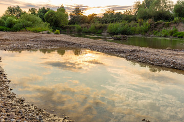 Black river at sunset, Romania, Europe