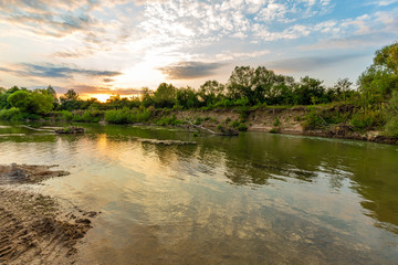 Obraz premium Black river at sunset, Romania, Europe