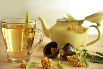 Cup of herbal tea with linden flowers
