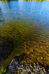 Lake water and boulders, Armenia