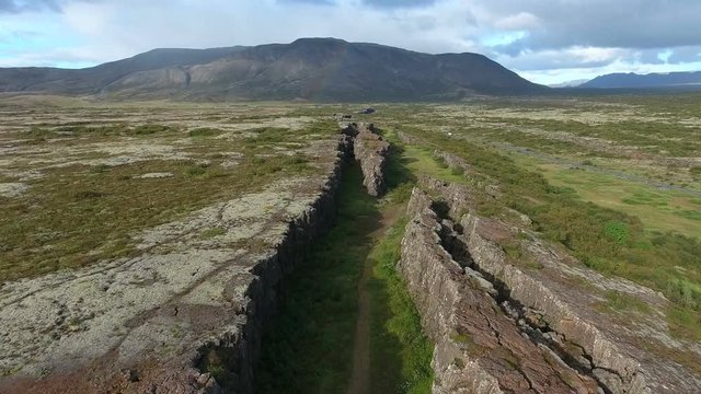 Aerial view of Thingvellir park in Iceland. Camera tilts up in the end.