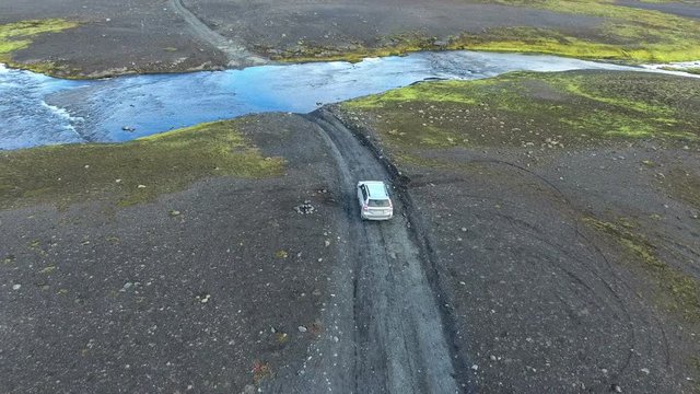 Crossing a ford in a 4x4 in Sprengisandur, Iceland.