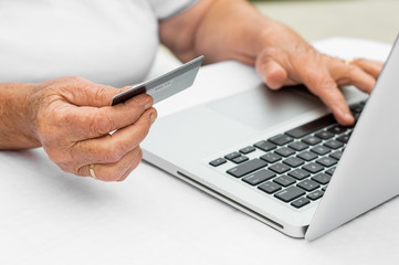 Grandmother buying online with credit card