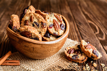 Homemade whole wheat oatmeal cookies with pecan nuts, dried cranberries and honey