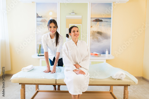 Woman Beautician Doctor With Patient In Spa Wellness Center Young