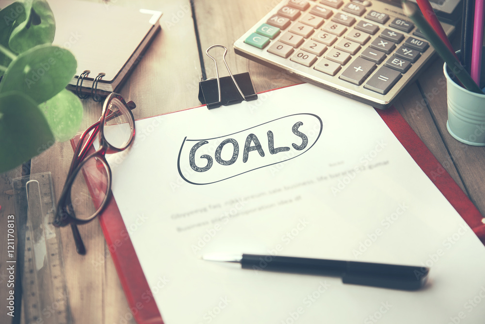 Poster goals text on notebook