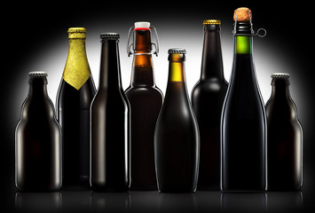Set of beer bottles with clipping path isolated on black gradient background