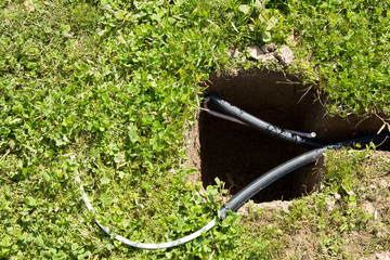 electric cable in pipes in the pit