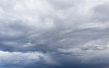 black clouds in the sky as the background