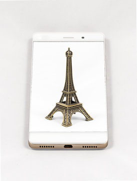 Modern smartphone displaying full screen picture of Paris, Franc