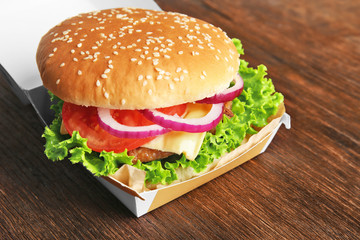 Hamburger on wooden background